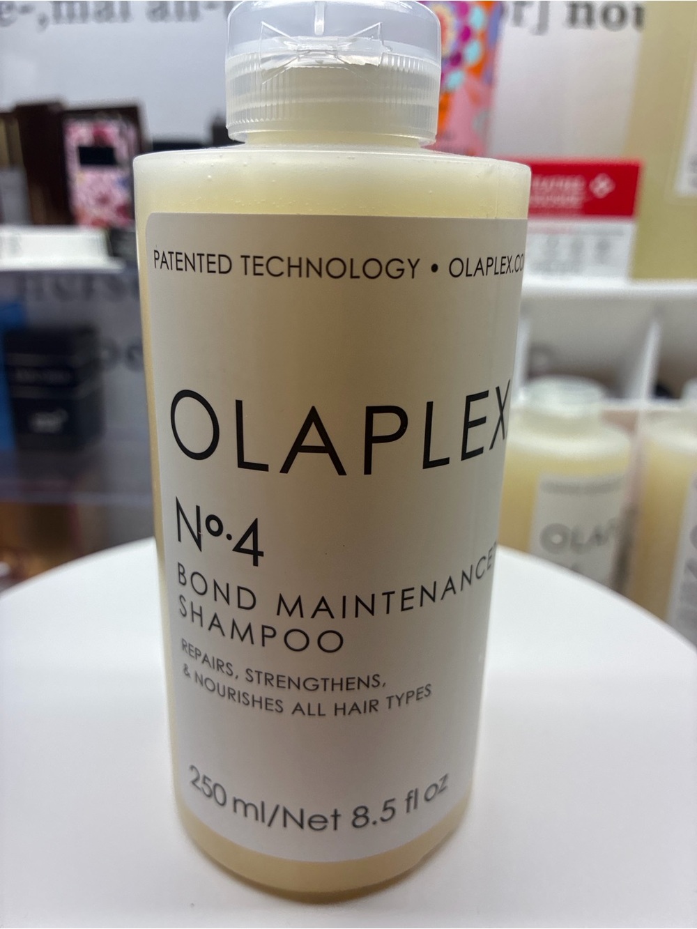OLAPLEX No.4 Bond Maintenance Shampoo — Cream White